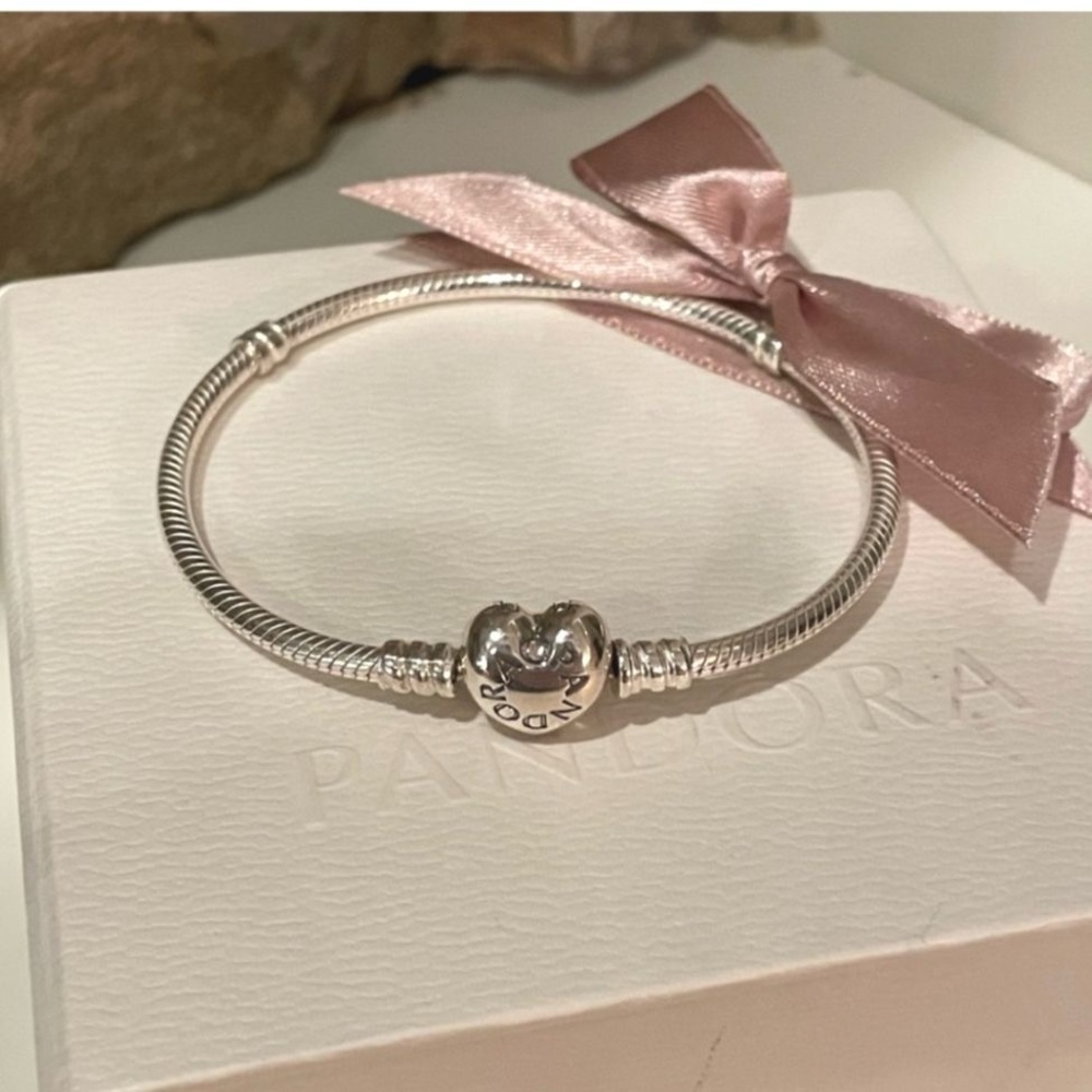 Pandora Silver Bracelet along with mystery charm